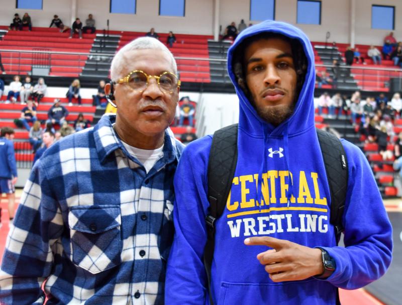Calvin Harmon and grandson Andrew Long at the state championship wrestling duals. DAVE FREDERICK PHOTO